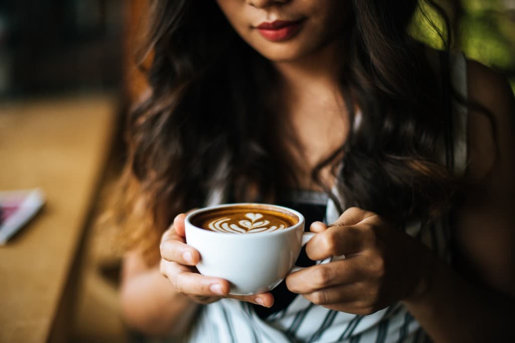 Latte art served at a specialty coffee shop